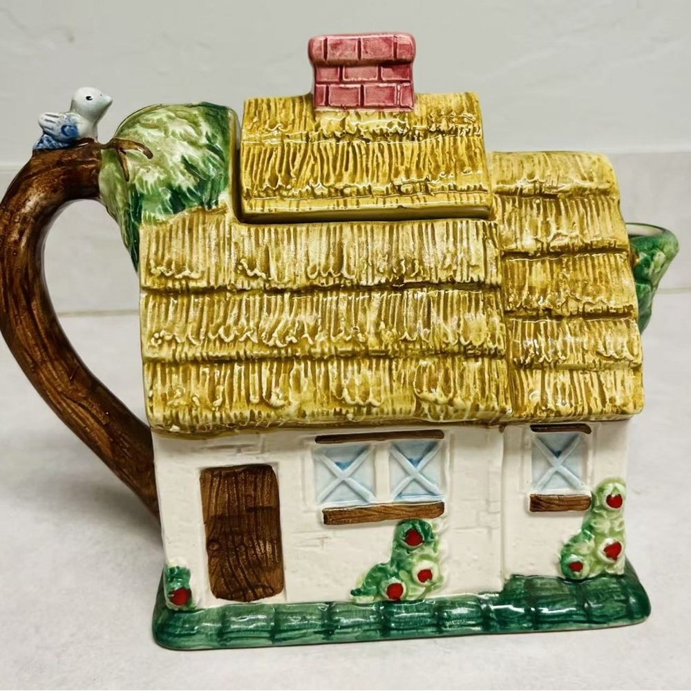 Teapot with Thatched Roof and Bird Accent 
Takahashi Of San Francisco